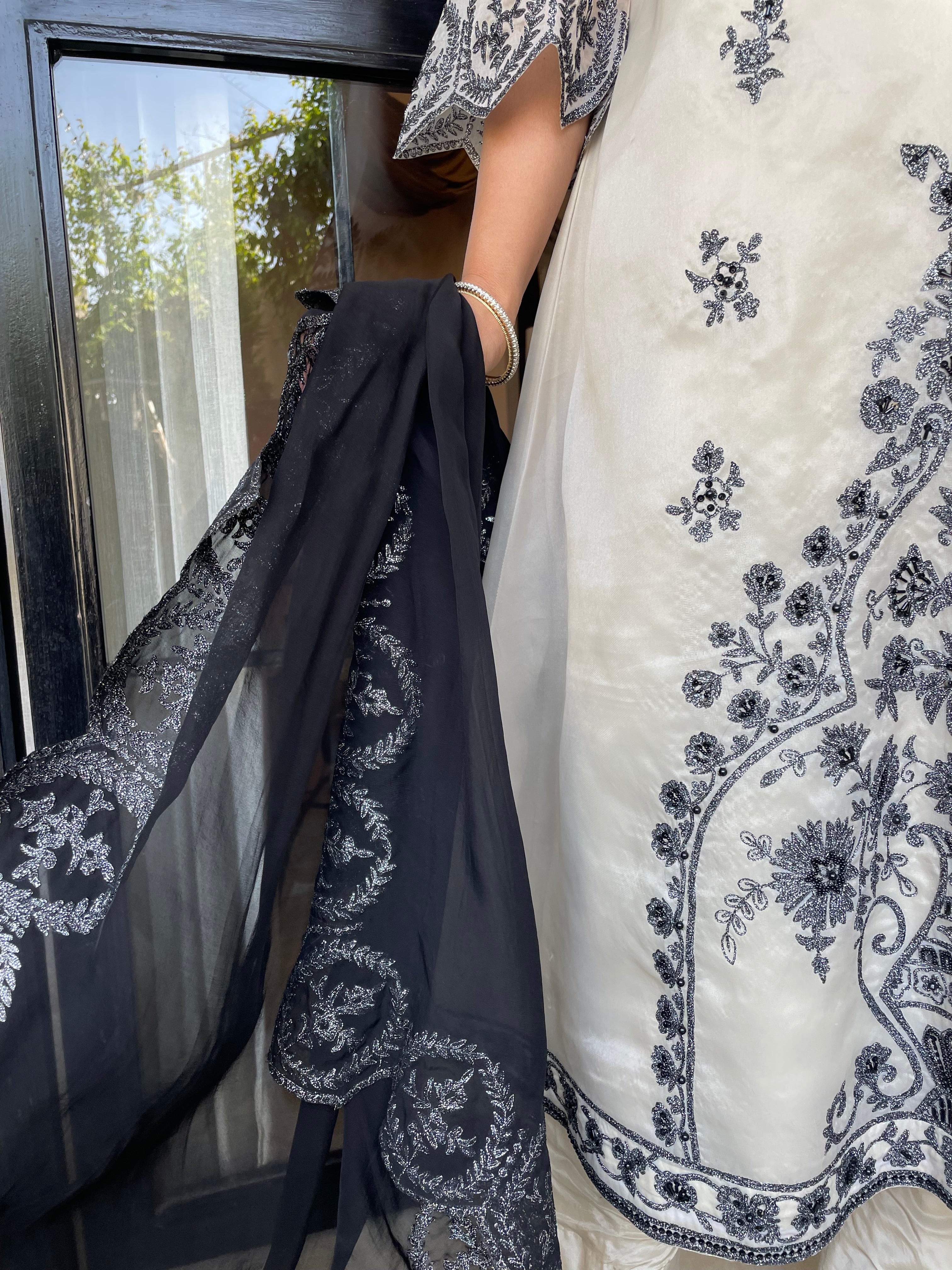 Ivory Black suit